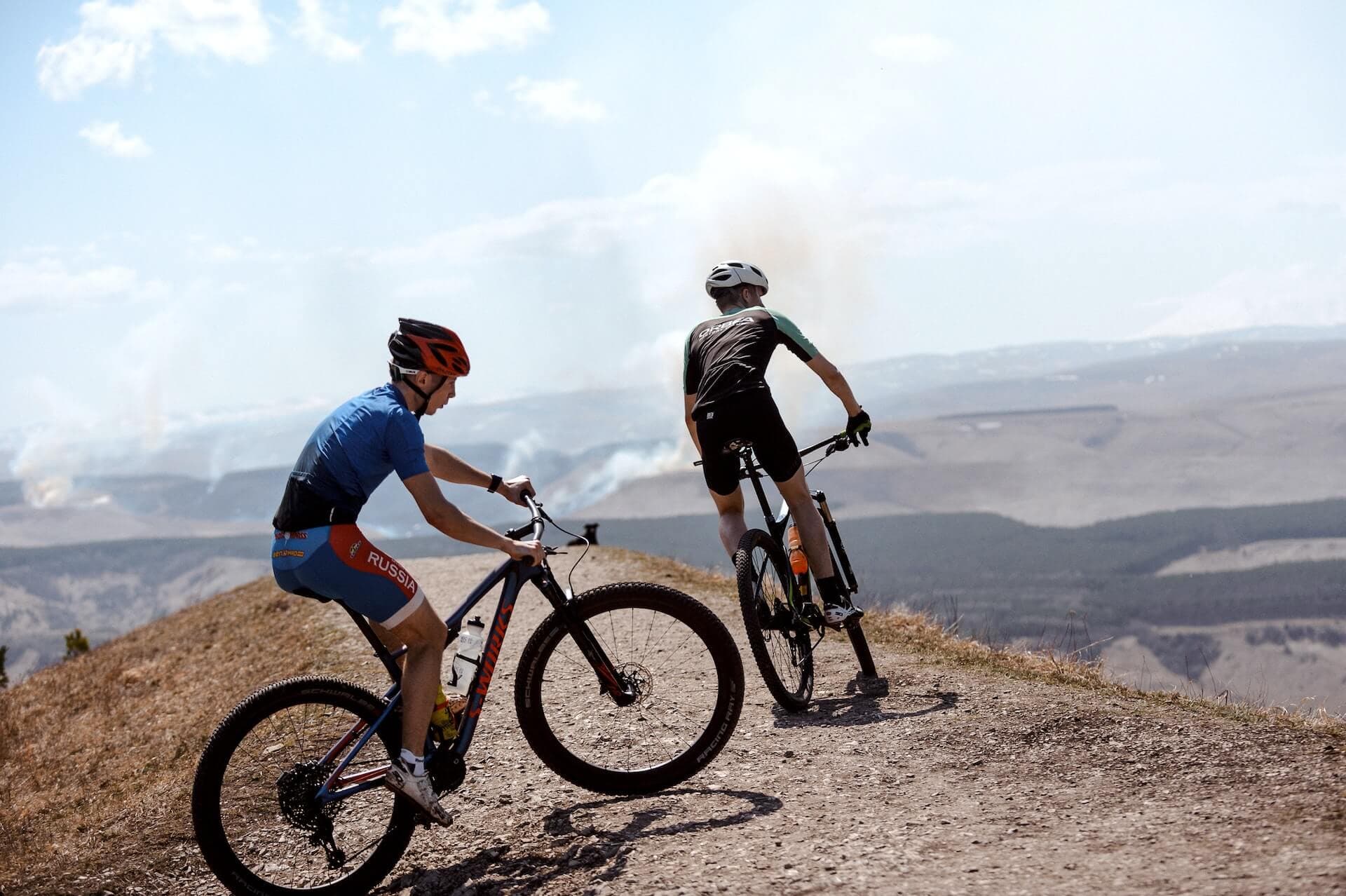 Mountain biker riding loose red earth in the High Atlas