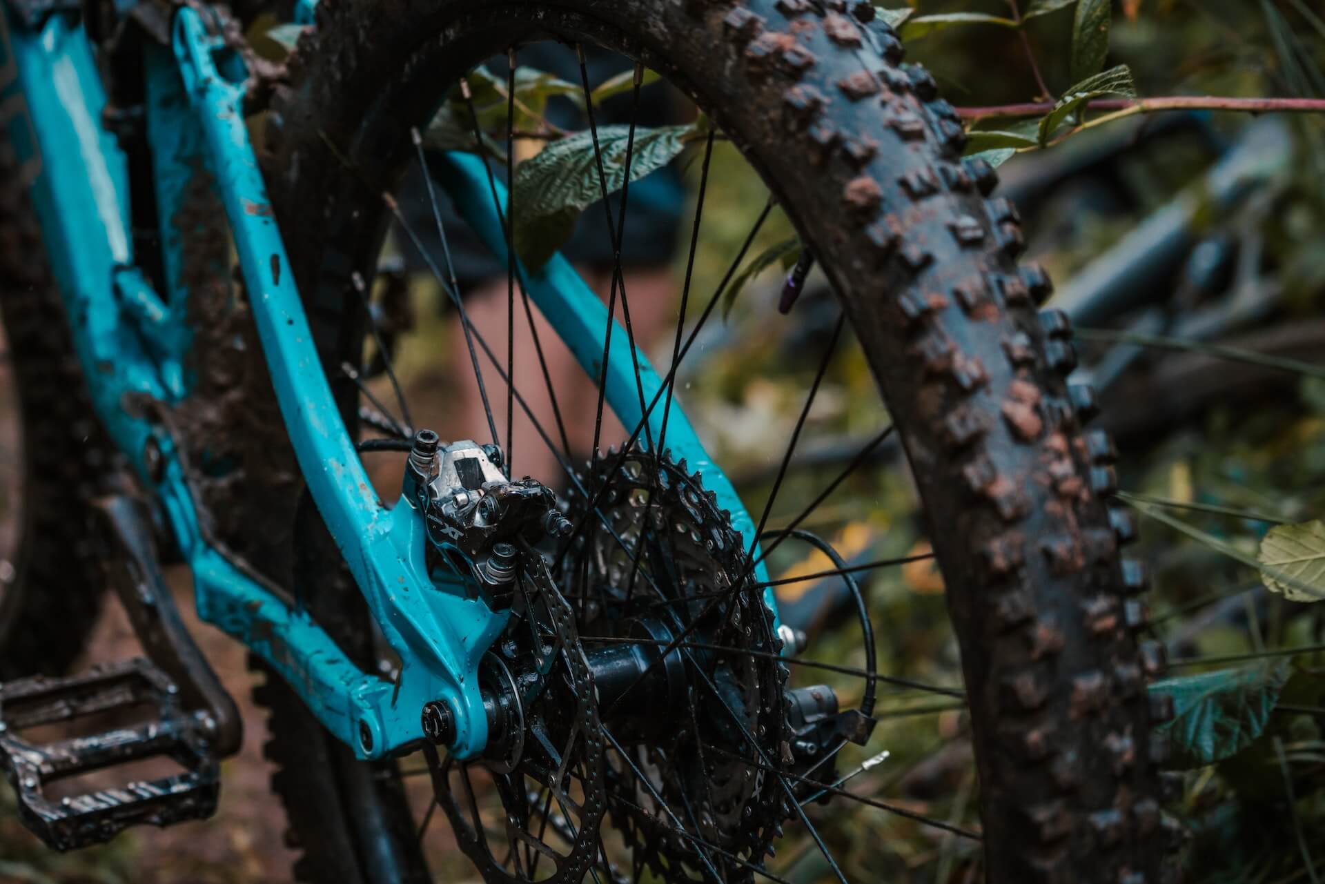 Mud-covered cassette and tyre after a day on Atlas trails