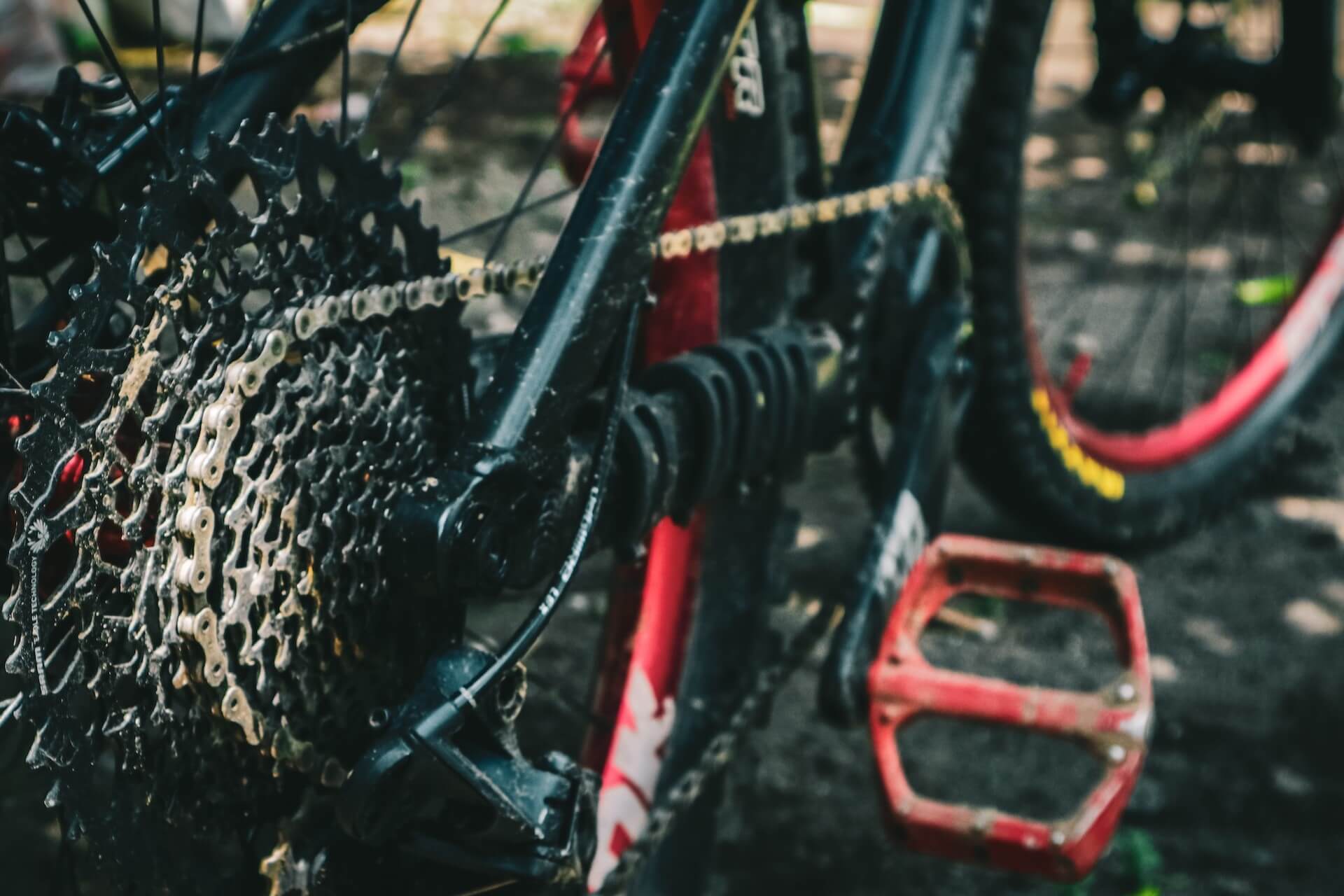Close-up of a mountain bike drivetrain caked in Atlas dust