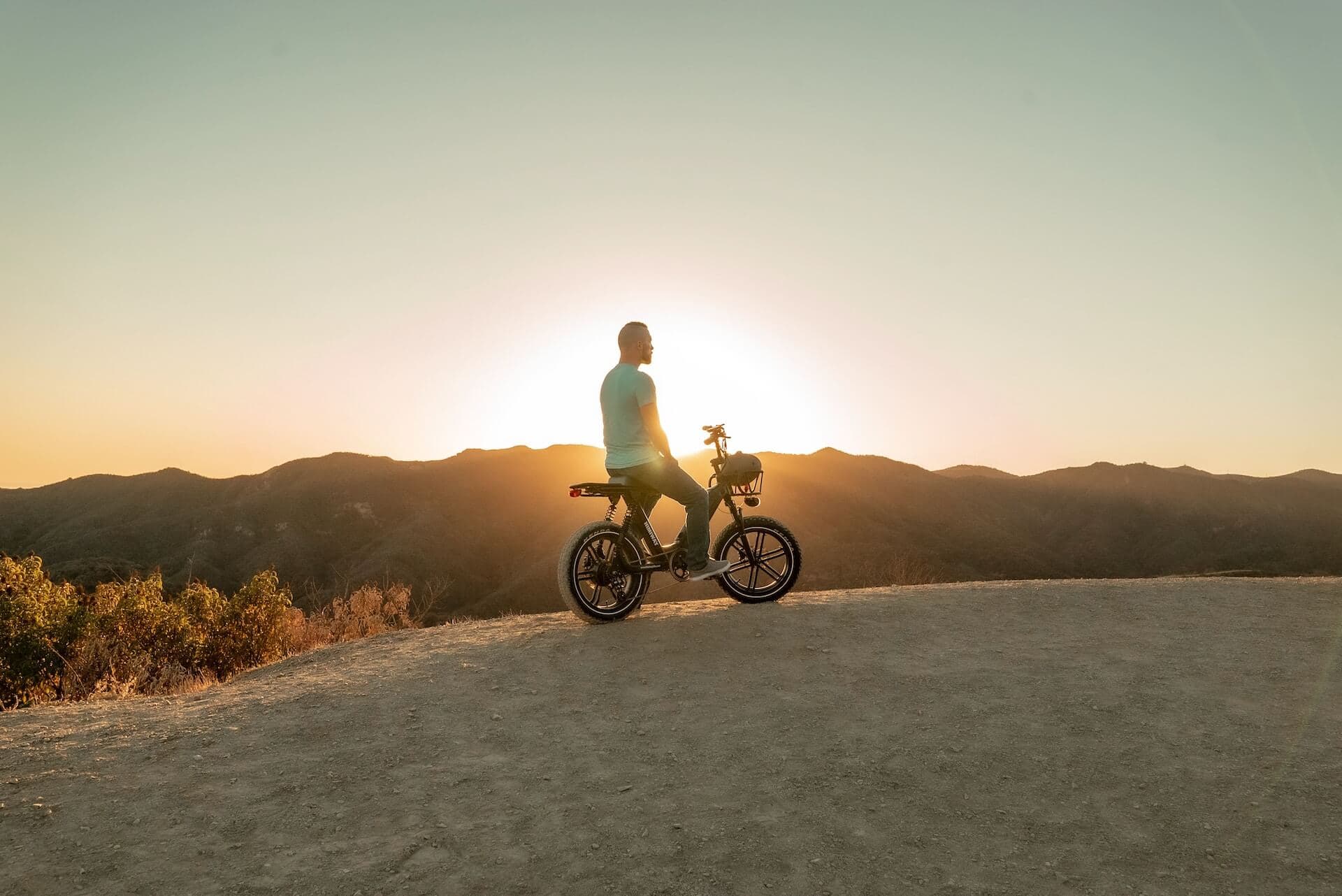 Rider above an Atlas valley in late afternoon light